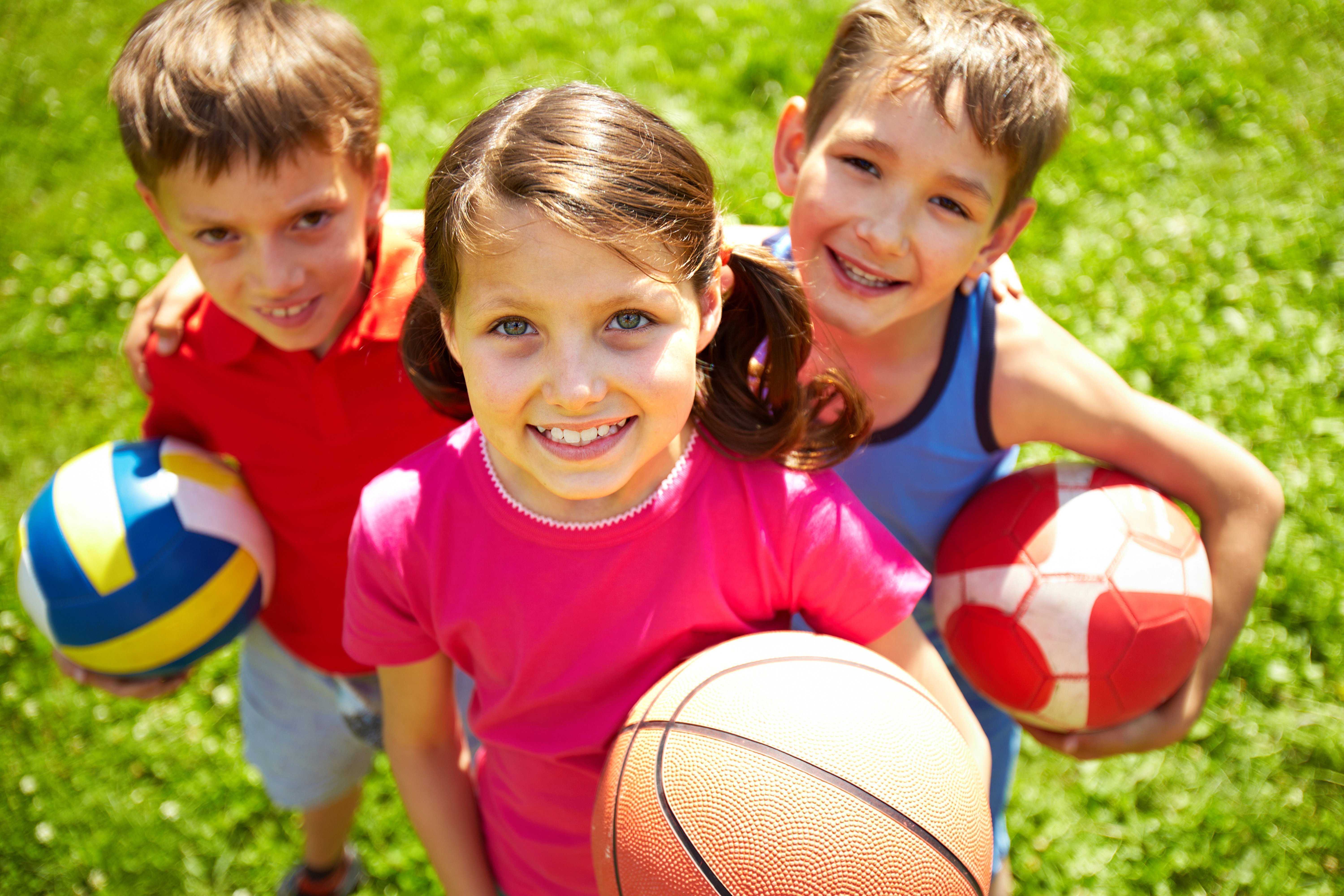 Do you enjoy playing sports. Детский спорт. Спортивные дети. Мяч для детей. Здоровый спортивный ребенок.